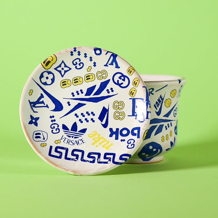 Bootleg NK Cup & Saucer | contemporary ceramics -  MENA FUECO studio.